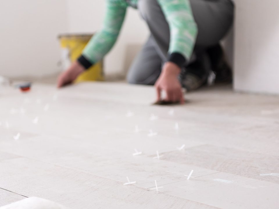 handyman installing flooring