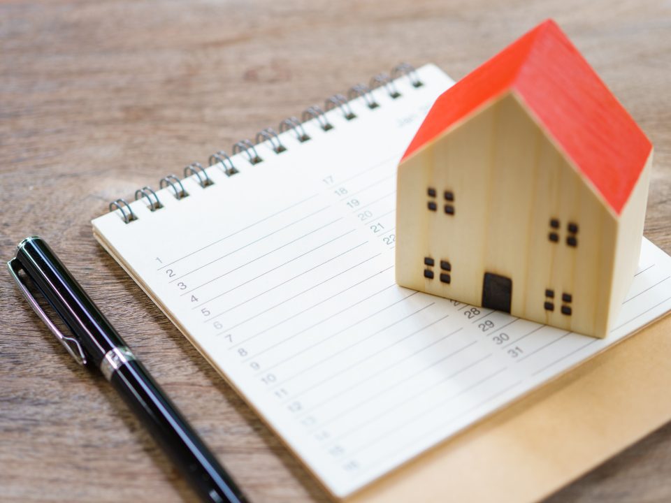 homeowners completing home maintenance checklist